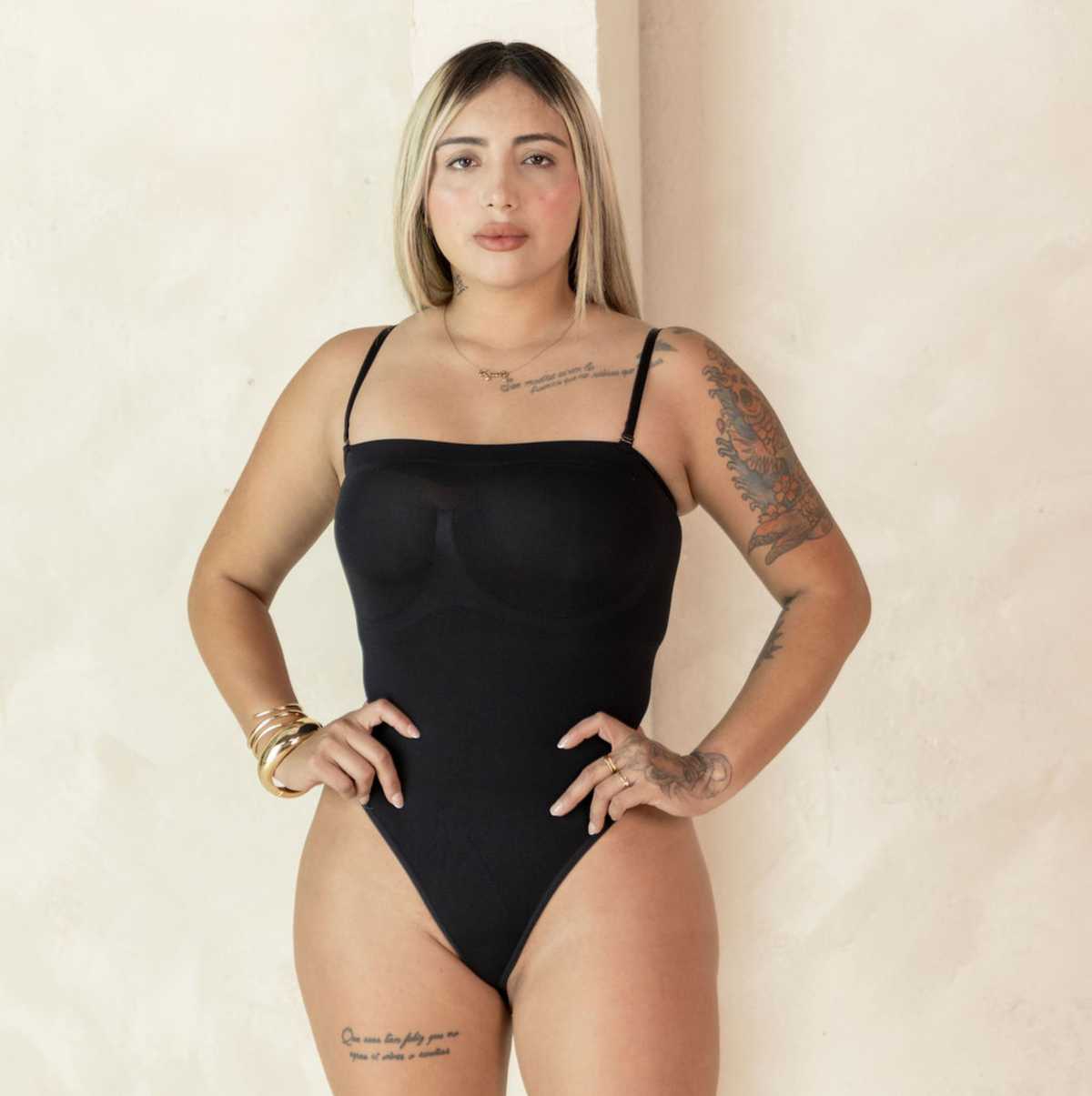 Detachable straps, black body shape wear, thong.