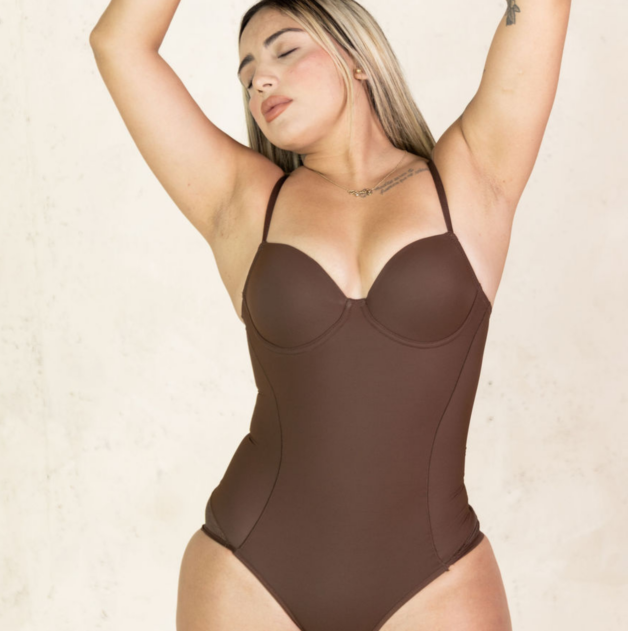 snatched brown shape wear, padded breast.